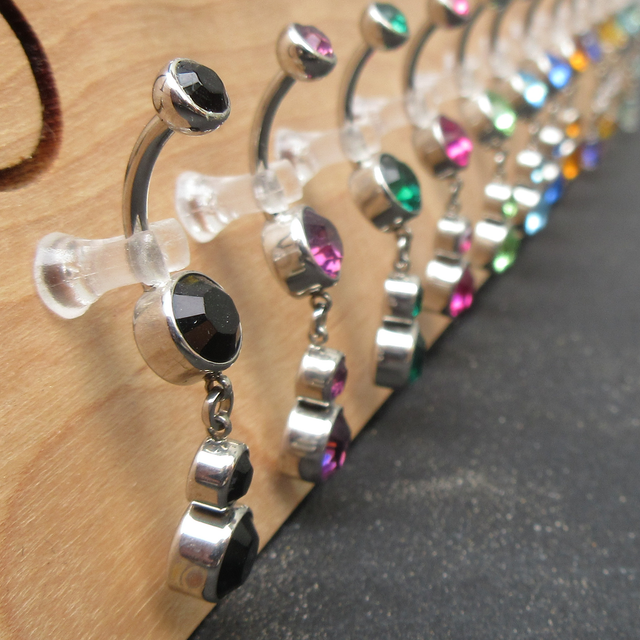 TRIPLE BEZEL-SET CZ NAVEL CURVES